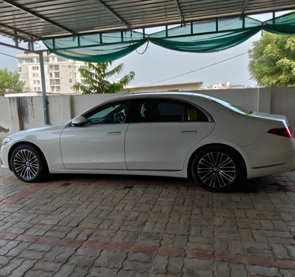 Side profile of Mercedes-Benz S450 luxury sedan for executive and VIP travel.
