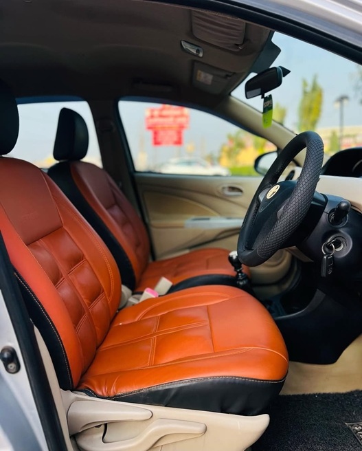 Toyota Etios front cabin with premium leather seats by Limo Car India, offering a comfortable and spacious interior for airport transfers and outstation travel.